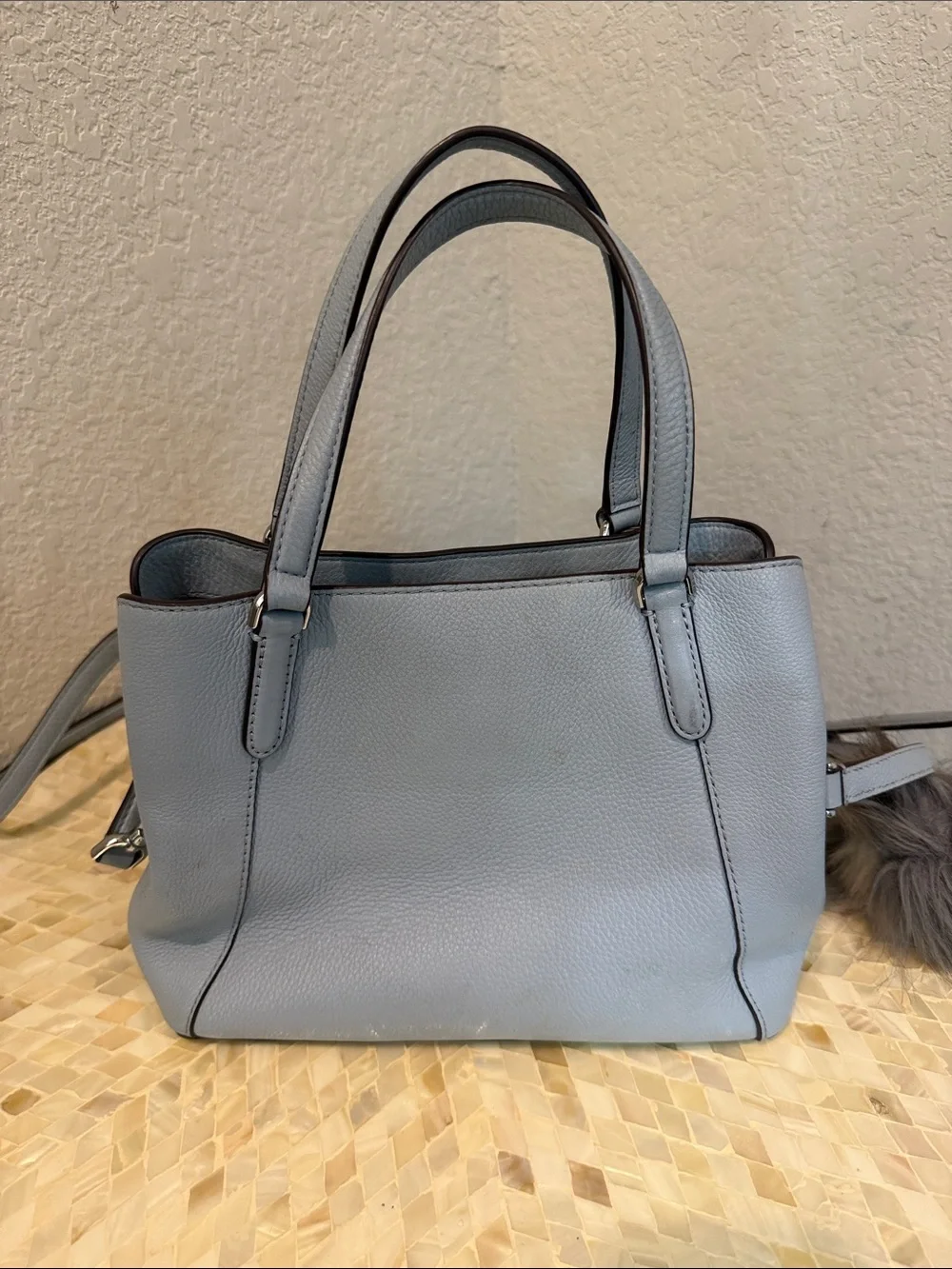 Kate Spade pale blue pebbled leather satchel with charm